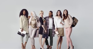 Kim Kardashian Shows Off Deep Cleavage In Plunging Top & Mini