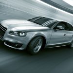 Car driving fast in tunnel