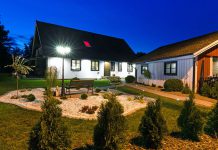 Swedish Villa House with Modern Garden at Night Time