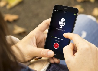 Kim Kardashian Shows Off Deep Cleavage In Plunging Top & Mini